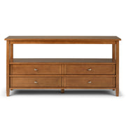 Light golden brown Simpli-Home Warm Shaker wide console sofa table with sleek, modern design and sturdy wooden construction.