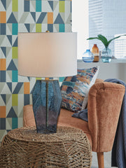 Blue glass table lamp from Signature Design by Ashley® featuring a modern design and sleek base, perfect for contemporary decor.