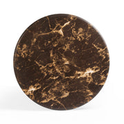 Dark brown Byron round coffee table by TOV Furniture with smooth wooden surface and modern design, shown in a living room setting.