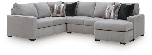 Benchcraft Lakepoint stationary sectional sofa with plush cushions and contemporary design, shown in a modern living room setting.