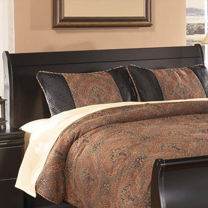 Black Huey Vineyard Queen Sleigh Headboard by Signature Design Ashley featuring curved wood details and classic sleigh design.