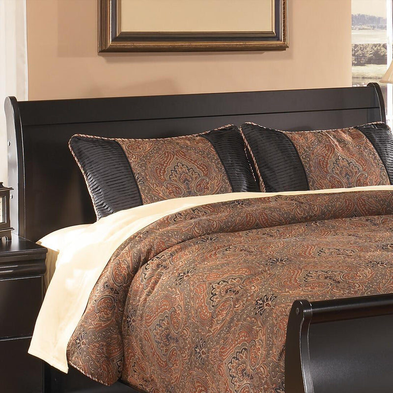 Black Huey Vineyard Queen Sleigh Headboard by Signature Design Ashley featuring curved wood details and classic sleigh design.