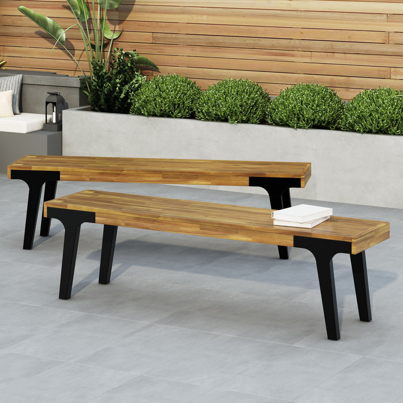Pair of teak dining benches from Noble House, showcasing sturdy wooden design suitable for kitchen or dining room seating.