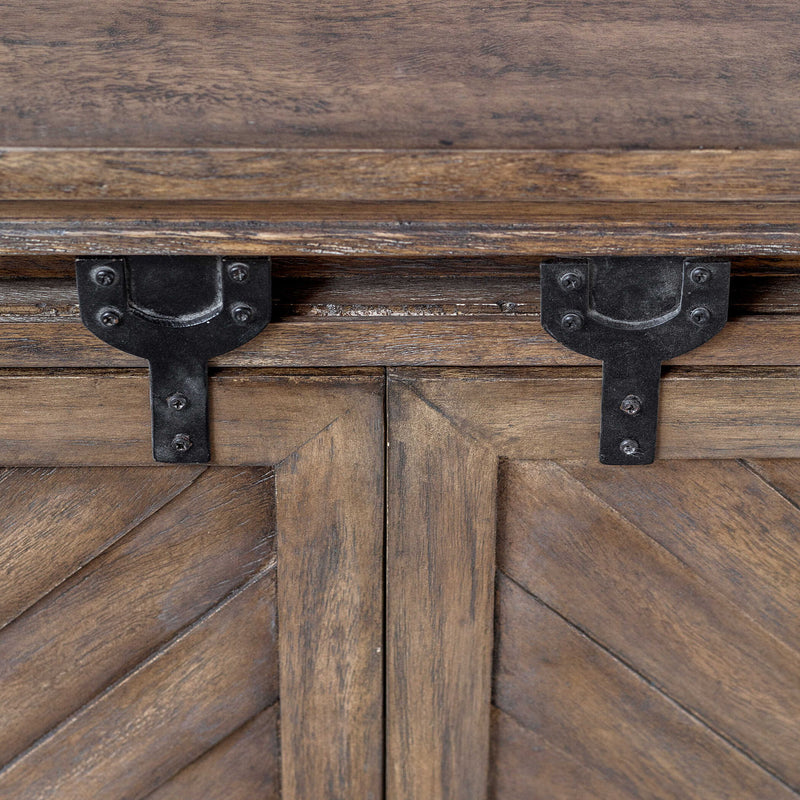 Uttermost Primalia barn door media console in light brown wood, TV stand with sliding barn doors and rustic design.