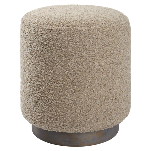 Uttermost Avila accent ottoman with plush fabric and wooden legs, versatile piece for living room or bedroom decor.