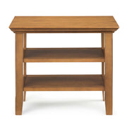 Handcrafted Acadian narrow side table by Simpli-Home, featuring a sleek wooden surface and tapered legs.