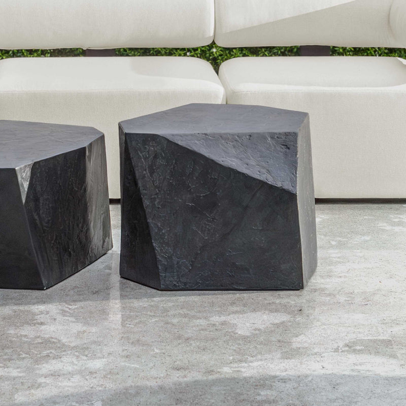 Uttermost Parra outdoor coffee table with a textured surface and modern design, suitable for outdoor patio or garden spaces.