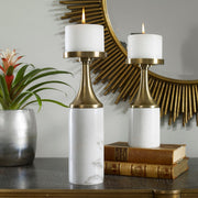 Set of two Castiel marble candleholders by Uttermost, white and gold, featuring elegant cylindrical design with smooth marble finish.
