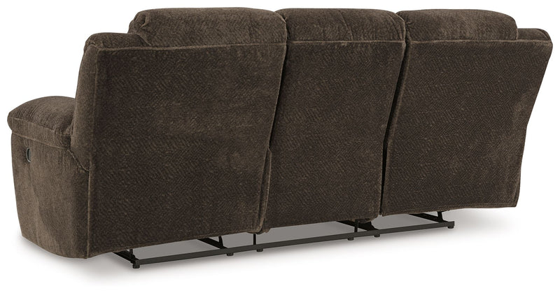 Signature Design by Ashley Frohn reclining living room set with plush sofas and loveseats, featuring padded armrests and reclining features.
