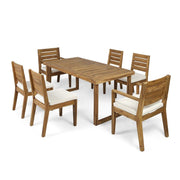 Seven-piece outdoor dining set with beige cushions, natural sandblasted finish, including table and chairs from Noble House.