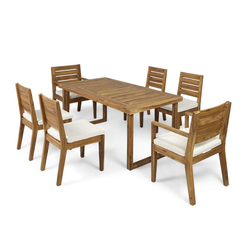 Seven-piece outdoor dining set with beige cushions, natural sandblasted finish, including table and chairs from Noble House.