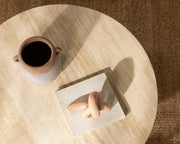 Idella - Travertine Round Table - R&R Furniture Gallery (Fountain Valley, CA)