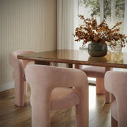 TOV Furniture Malone dining arm chair with upholstered seat and backrest, featuring sleek modern design for dining room decor.