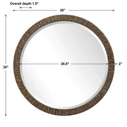 Uttermost Wayde Bark Round Wall Mirror with gold finish, featuring a textured bark design, hanging on a wall.