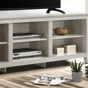 Benito TV stand by Lilola Home with open shelves and cable management for organized media storage.