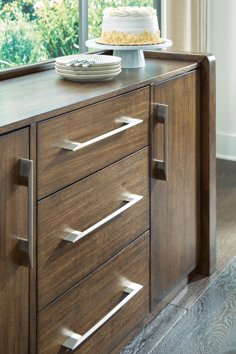 Benchcraft Marxmore brown dining room server with cabinets and drawers, designed for stylish and functional kitchen storage.