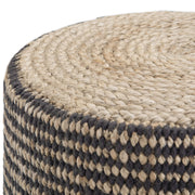Larissa handcrafted round braided pouf by Simpli-Home, beige accent pouf with woven braided design, suitable for living room or seating area.