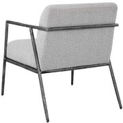 Light gray Uttermost Brisbane accent chair with wooden legs, featuring modern design and plush upholstery for stylish comfort.