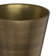 Leyla side table by Simpli-Home with antique brass finish, featuring a sleek round top and modern metal base.