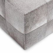 Square upholstered ottoman in Sparrow Gray from Classic Home's Landyn collection, featuring soft fabric and modern design.