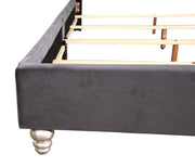 Transitional upholstered bed by Glory Furniture with a padded headboard and fabric frame, showcasing a stylish bedroom setup.