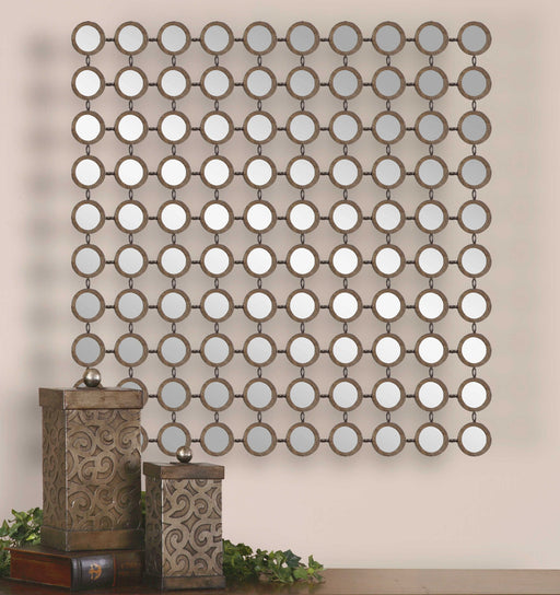 Uttermost Dinuba wall mirror in antique silver champagne finish, decorative wall decor with elegant frame design.