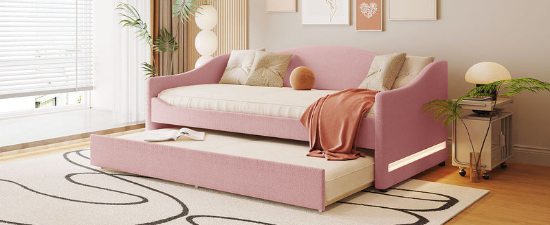 Halcyon Home upholstered daybed with integrated trundle and light, showcasing a stylish and functional trundle bed design.