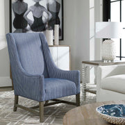 Uttermost Caelina textured white table lamp with cylindrical base and fabric shade, designed for modern home decor.