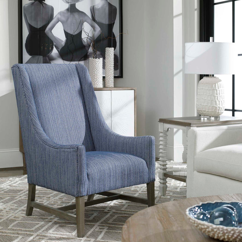 Uttermost Caelina textured white table lamp with cylindrical base and fabric shade, designed for modern home decor.