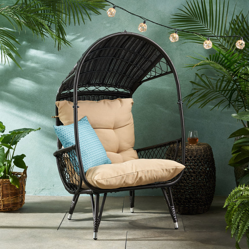 Noble House outdoor wicker standing basket chair with cushion, accent furniture for patio or garden seating.