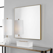 Uttermost Alexo square wall mirror with sleek frame, showcasing modern design and reflective glass for stylish home decor.