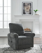 Signature Design by Ashley Aureta power lift recliner with plush fabric and padded armrests, offering comfortable support and easy reclining.
