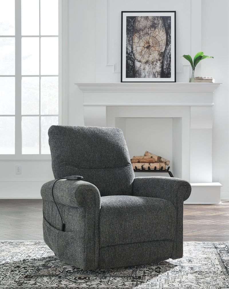 Signature Design by Ashley Aureta power lift recliner with plush fabric and padded armrests, offering comfortable support and easy reclining.