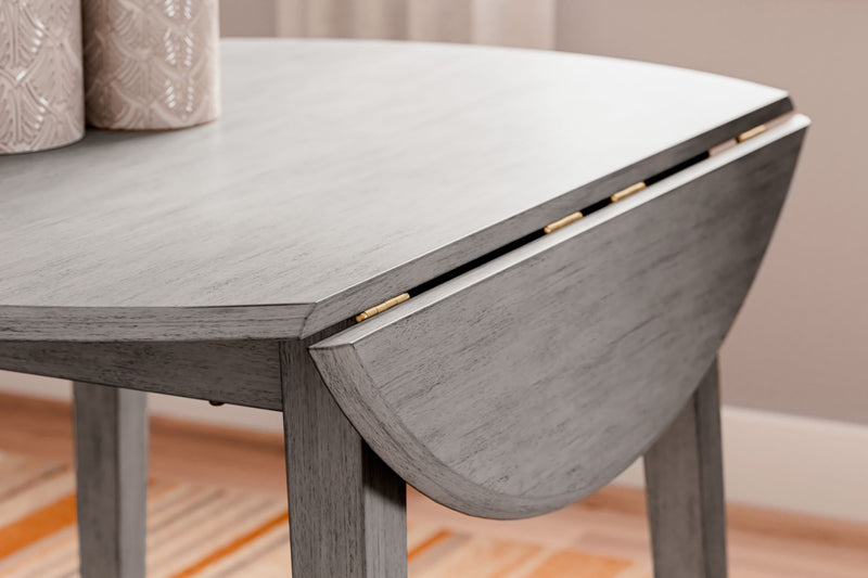 Shullden - Round Drm Drop Leaf Table - Gray - R&R Furniture Gallery (Fountain Valley, CA)