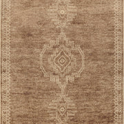 Classic Home Luxor Cairo hand-knotted area rug with intricate patterns and rich colors displayed on a hardwood floor.