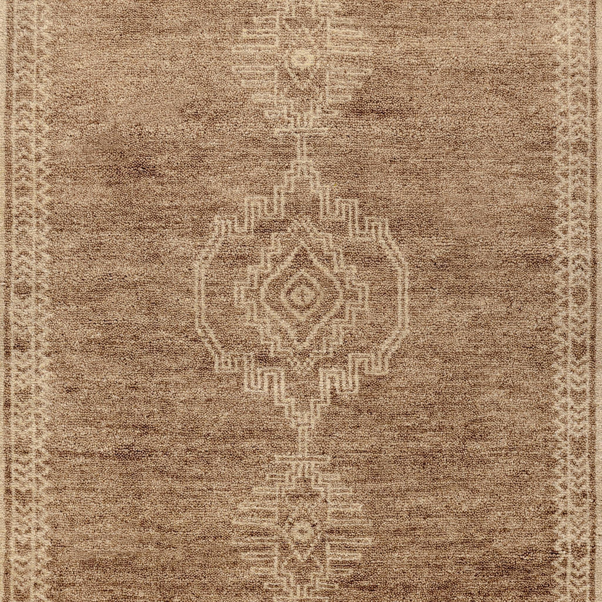 Classic Home Luxor Cairo hand-knotted area rug with intricate patterns and rich colors displayed on a hardwood floor.
