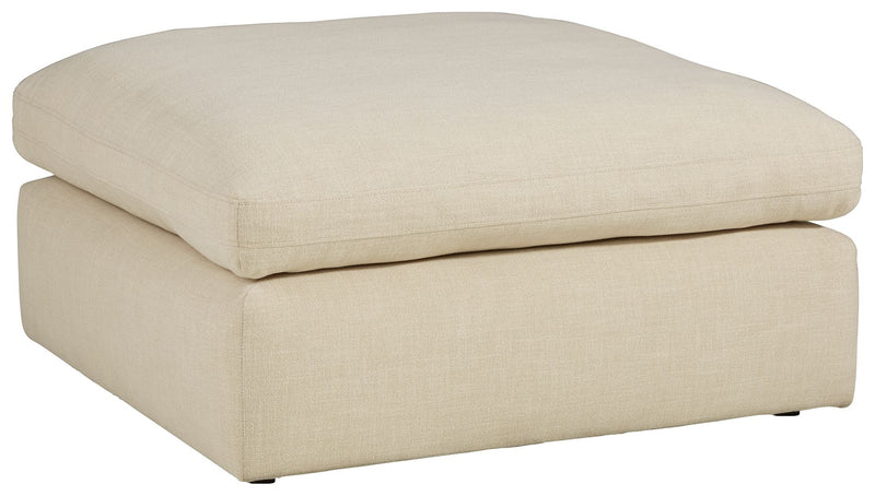 Benchcraft Elyza oversized accent ottoman with plush fabric and a modern design, perfect for living room decor.