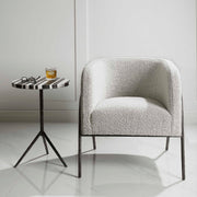 Uttermost Jacobsen accent chair with plush fabric and wooden legs, stylish modern design for living room or lounge area.