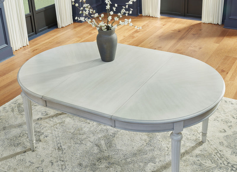Montelaine - Oval Dining Room Extension Table - Antique White - R&R Furniture Gallery (Fountain Valley, CA)