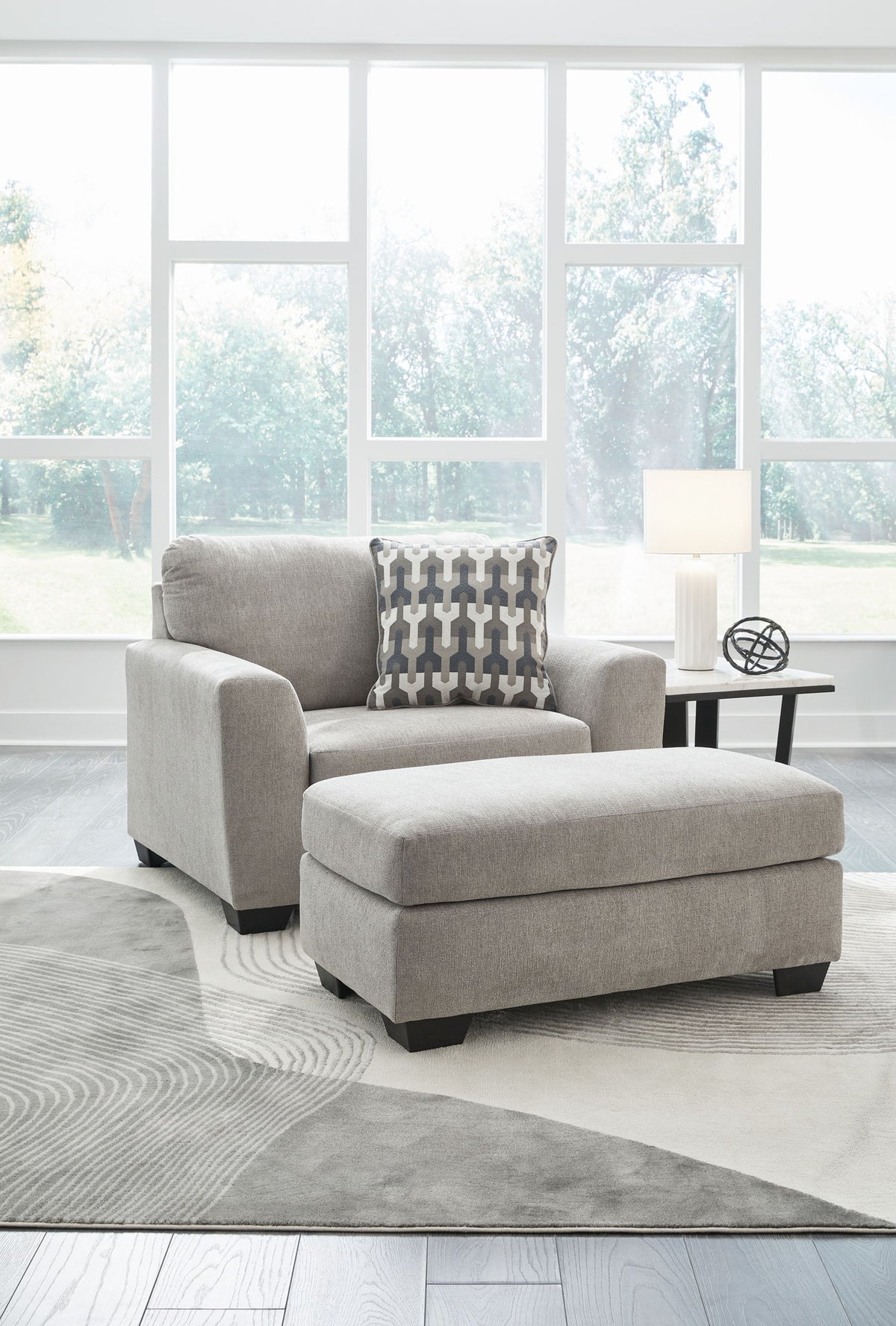 Signature Design by Ashley Avenal Park living room set with stationary chair and ottoman in a cozy, modern upholstery.