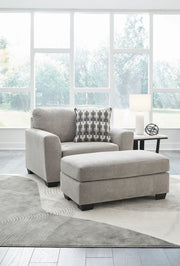Signature Design by Ashley Avenal Park living room set with stationary chair and ottoman in a cozy, modern upholstery.