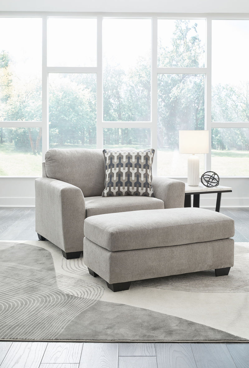 Signature Design by Ashley Avenal Park living room set with stationary chair and ottoman in a cozy, modern upholstery.