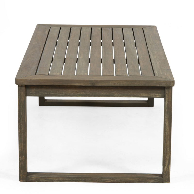 Noble House Samwell outdoor 2-piece coffee table and loveseat set with cushioned seating and weather-resistant wicker design.