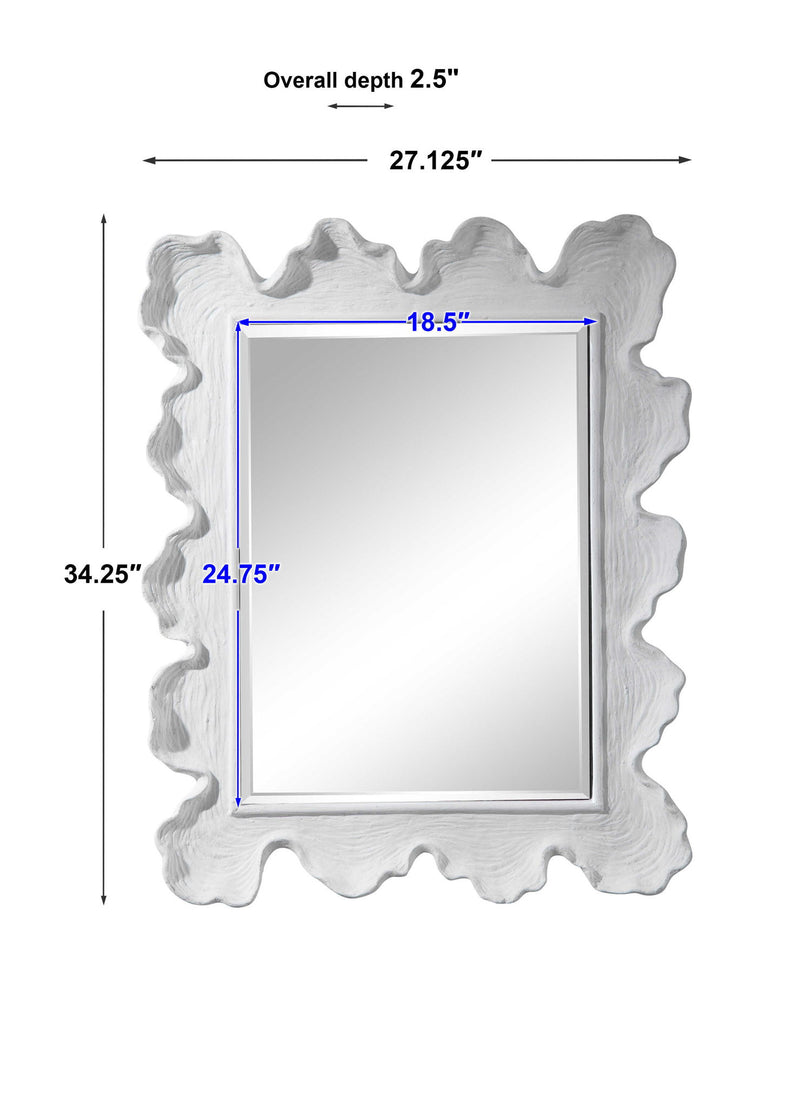 Uttermost Sea Coral wall mirror featuring a detailed coral-inspired frame with a reflective glass surface.