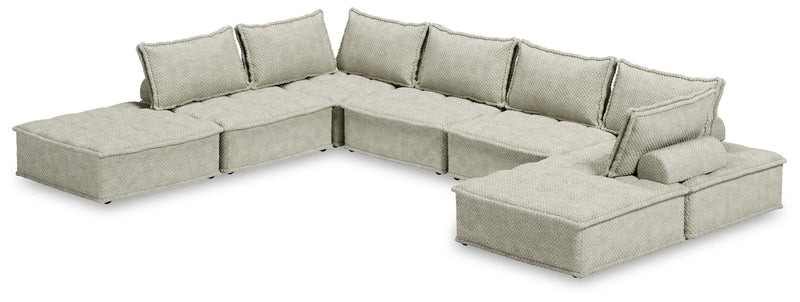 Signature Design by Ashley stationary sectional Bales with plush cushions and neutral fabric upholstery in a modern living room setting.
