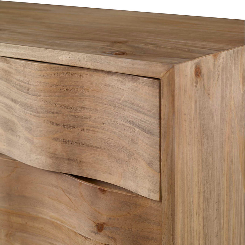 Light oak accent chest by Uttermost with light brown finish, featuring sleek design and storage drawers.
