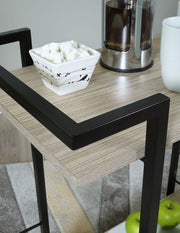 Signature Design by Ashley Waylowe Bar Cart with metal frame, glass shelves, and casters for mobile serving and storage.