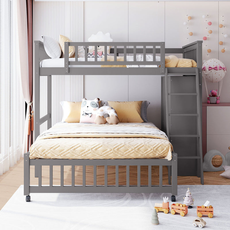 DreamHaus bunk bed with six drawers, flexible shelves, and a bottom bed on wheels, showcasing its modern design and storage features.