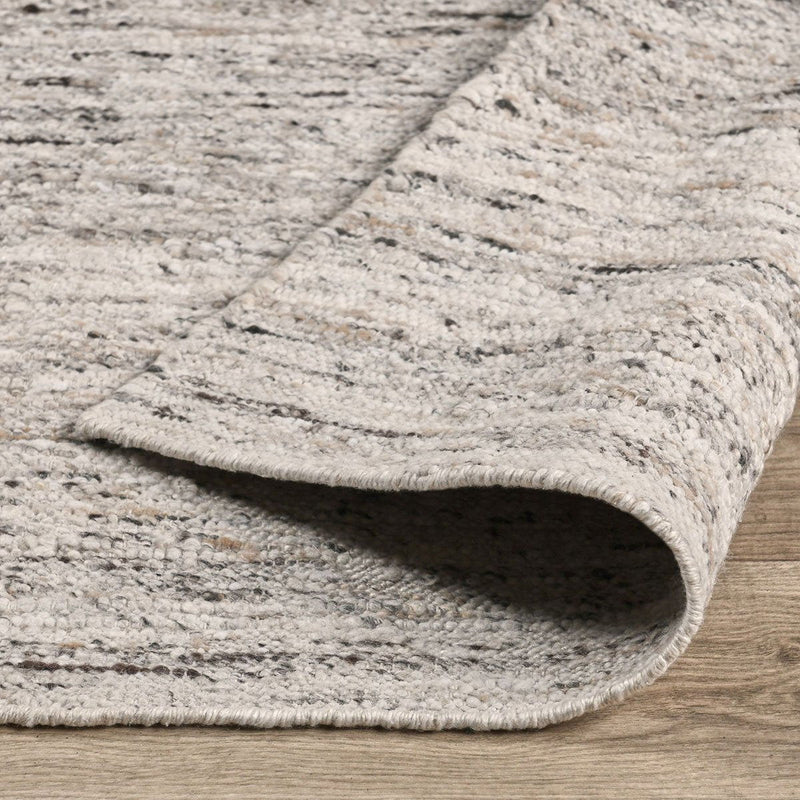 Classic Home Havasu area rug featuring a detailed geometric pattern in neutral tones on a soft, woven fabric.