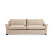 Olivia stationary sofa by Classic Home with plush fabric upholstery and modern design, shown in a cozy living room setting.